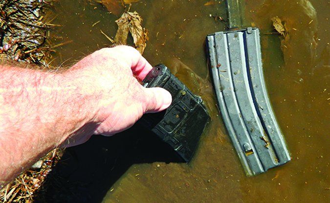 gun magazine in mud